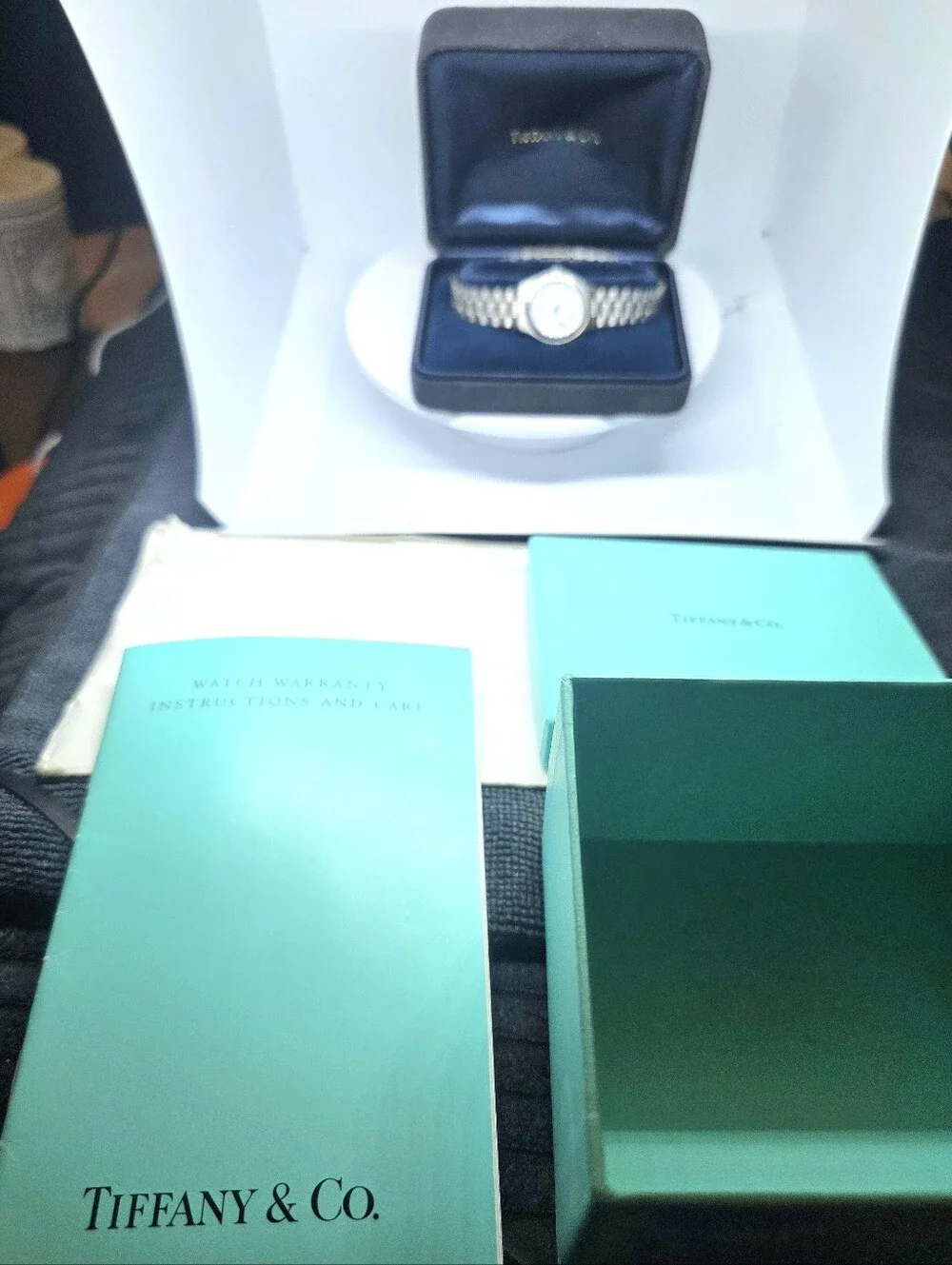 Tiffany & Co. Portfolio Stainless Steel Quartz Watch (Pre-loved) with its origin